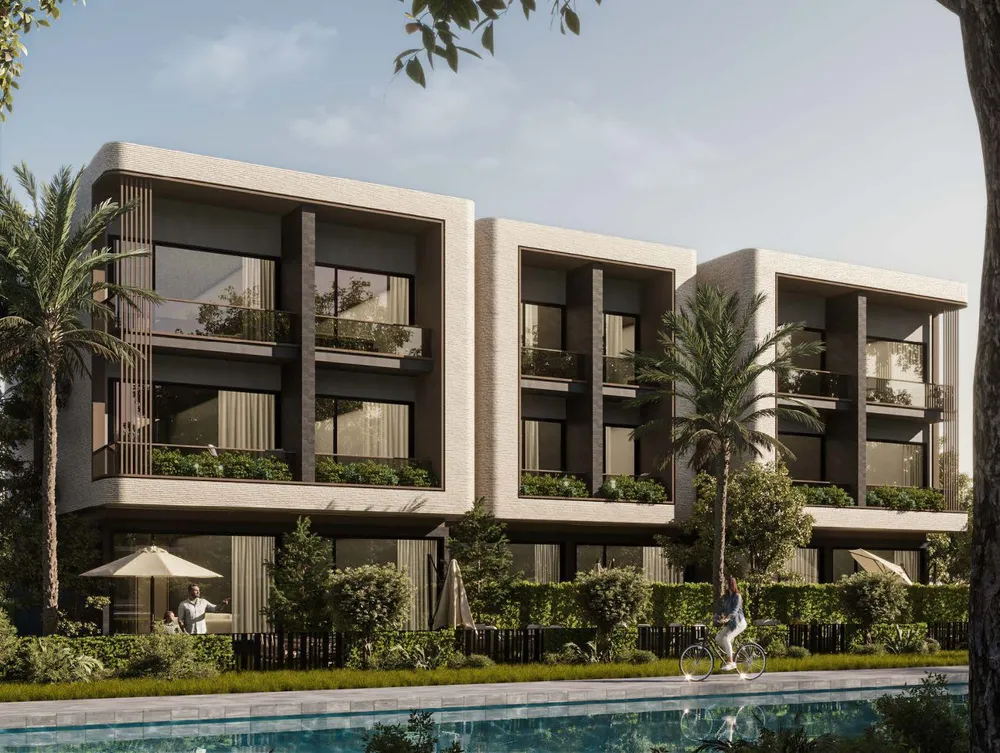 كمبوند إيست فيل التجمع الخامس | Eastville New Cairo - صف من التاون هاوس وحمام السباحة