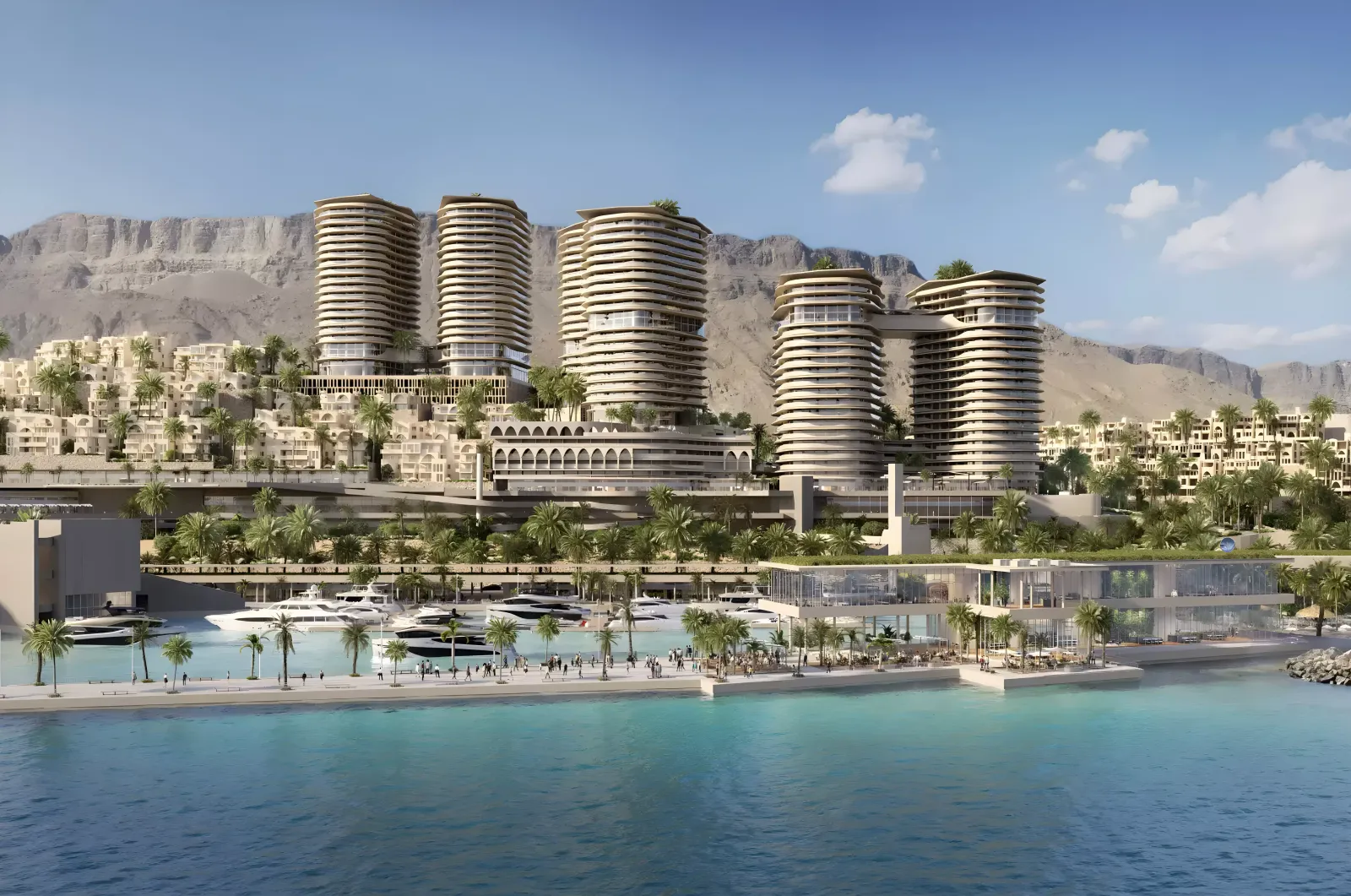 أبراج دائرية خلف مارينا اليخوت وجبل الجلالة في أبراج مارينا